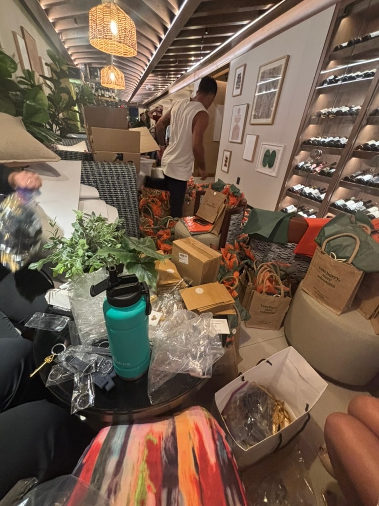 Behind-the-scenes operations at a launch event, soft launch production in flight.